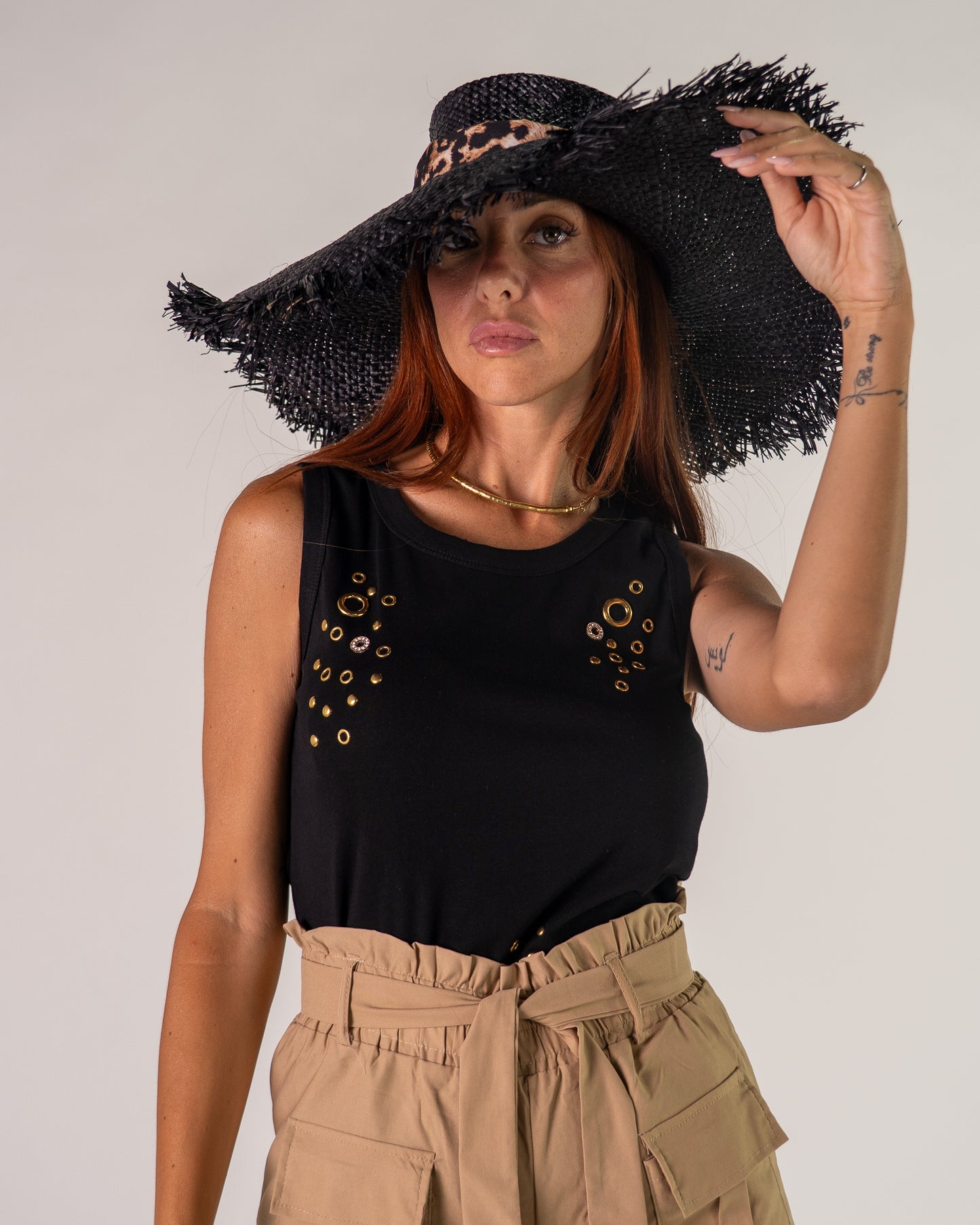 Canotta occhielli strass